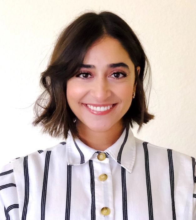 Dr. Erene Saad providing periodontal and implant care at Long Beach Dental Health